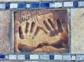 Hand print of Jean Claude Van Damme in Cannes on the Boulevard de la Croisette directly in front of the Palais des Festivals