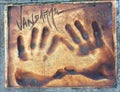 Hand print of Jean Claude Van Damme in Cannes on the Boulevard de la Croisette directly in front of the Palais des Festivals