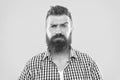 Are you serious. Man serious face raising eyebrow not confident. Have some doubts. Hipster bearded face not sure in Royalty Free Stock Photo