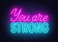 You are strong neon sign on brick wall background.