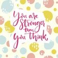 You are stronger than you think. Motivation quote lettering on playful green and pink hand drawn circles background