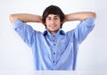 You too can be this relaxed in your working environment. Portrait of a handsome young man. Royalty Free Stock Photo