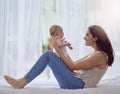 Are you trying to say your first word. a young woman bonding with her baby boy at home. Royalty Free Stock Photo