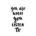 You are what you listen to - hand drawn lettering quote isolated on the white background. Fun brush ink vector Royalty Free Stock Photo