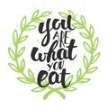 You are what you eat, modern ink brush calligraphy with wreath.