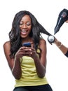 You wont believe how amazing my hair looks. Studio shot of an attractive young woman having her hair blow-dryed.