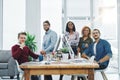 You wont find a more hardworking team. Portrait of a team of young go getters working in a modern office. Royalty Free Stock Photo