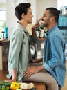 Are you working up an appetite. a affectionate young couple preparing a meal together in their kitchen. Royalty Free Stock Photo