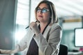 Youll find just what youre looking for online. a businesswoman sitting at her desk.