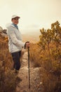 Youll find me on a mountain top. a mature woman hiking in nature. Royalty Free Stock Photo