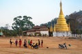 Youn men playing a ball game in a village in Burma Myanmar Royalty Free Stock Photo