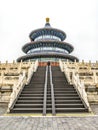 Yound Couple in front of the Temple of Heaven imperial complex of religious buildings in southeastern part of Beijing