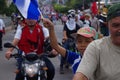 Yound kid with a flag in a Honduras protest against corruption and reelection oh Juan Orlando Hernandez 2018 september