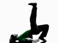 Young acrobatic break dancer breakdancing man silhouette