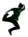 Young acrobatic break dancer breakdancing man silhouette Royalty Free Stock Photo