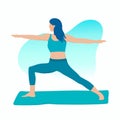 A young, active, attractive girl is doing yoga on a mat. Virabhadrasana pose. Meditation, stretching, healthy lifestyle Royalty Free Stock Photo