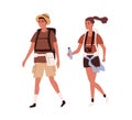 Young active couple traveling together with backpacks on summer holidays. Happy tourists walking with bags, camera and
