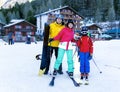 Young active family enjoys winter sports in the charming Swiss resort of Saas-Fee