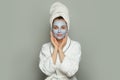 Young adorable woman in skin care beauty facial sheet face mask portrait. Facial treatment and skin care concept Royalty Free Stock Photo