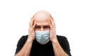 Young adult bald head man wearing respiratory protective medical mask Royalty Free Stock Photo