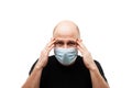 Young adult bald head man wearing respiratory protective medical mask Royalty Free Stock Photo