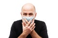 Young adult bald head man wearing respiratory protective medical mask Royalty Free Stock Photo