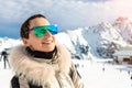 Young adult beautiful happy attractive caucasian smiling hiker woman leaping jumping high like star against skiing resort panorama Royalty Free Stock Photo