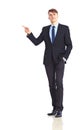 Young adult businessman pointing