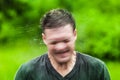 Young Adult Completely Drenched Shaking His head Royalty Free Stock Photo