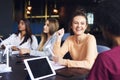 Young adult coworkers having business meeting