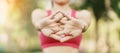 Young adult female in pink sportswear stretching muscle in the park outdoor, sport woman warm up ready for running and jogging in Royalty Free Stock Photo