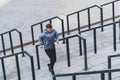 Young adult girl running outdoor in city Royalty Free Stock Photo