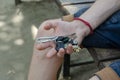 A young adult holds a bunch of keys in his hand. Royalty Free Stock Photo