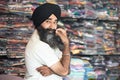 Young adult indian sikh seller man Royalty Free Stock Photo