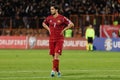 man on field in soccer game in front of crowd of fans