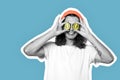 Young adult man covered eyes with kiwi Royalty Free Stock Photo