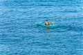 Young Adult Man Kayaks in the Blue Water - Mediterranean Sea Liguria Italy Royalty Free Stock Photo