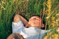Young adult man in spring grass Royalty Free Stock Photo