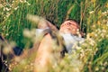 Young adult man in spring grass Royalty Free Stock Photo