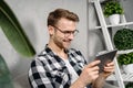 Young adult man using modern tablet computer Royalty Free Stock Photo