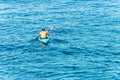 Young Adult Man Kayaks in the Blue Water - Mediterranean Sea Liguria Italy Royalty Free Stock Photo