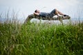 Young Adult Relaxing Peacefully in Nature Royalty Free Stock Photo