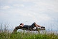 Young Adult Relaxing Peacefully in Nature Royalty Free Stock Photo