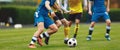Young Adult Soccer Players Compete at the Pitch. Football League Game Royalty Free Stock Photo