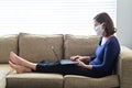 Young adult woman diagnosed as infected in Coronavirus in a self home isolation lock down quarantine
