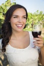 Young Adult Woman Enjoying A Glass of Wine in Vineyard Royalty Free Stock Photo