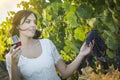 Young Adult Woman Enjoying A Glass of Wine in Vineyard Royalty Free Stock Photo