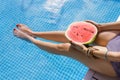 Young adult woman female relaxing on resort near pool in summer Royalty Free Stock Photo