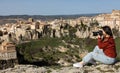 Woman tourist with photo camera, Cuenca, Spain Royalty Free Stock Photo