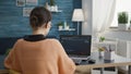 Young adult working on binary code programming at desk Royalty Free Stock Photo